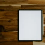 white rectangular frame on brown wooden table